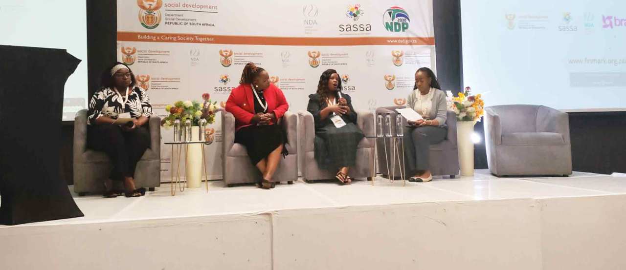 Women participating in a panel discussion at the DSD Policy Colloquium